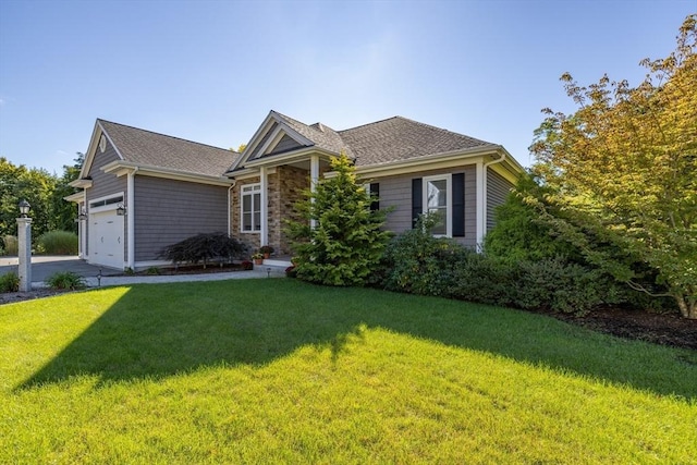 8 Garden St, Woburn, MA 01801 - single story home with a front lawn, an attached garage, stone siding, and driveway