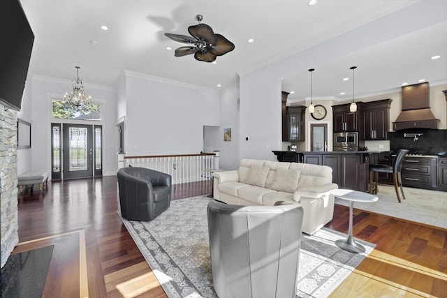 8 Garden St, Woburn, MA 01801 - living area featuring a ceiling fan, wood finished floors, recessed lighting, a chandelier, and ornamental molding