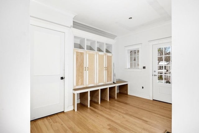 mudroom with hardwood / wood-style floors and ornamental molding