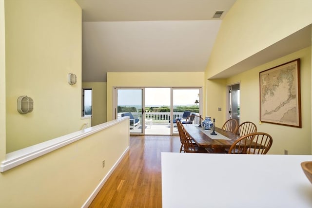 26 N Shore Dr Unit 7, Dartmouth, MA 02748 - dining room featuring high vaulted ceiling and wood finished floors