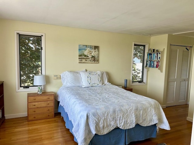 26 N Shore Dr Unit 7, Dartmouth, MA 02748 - bedroom with wood finished floors and a closet