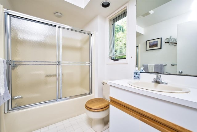 26 N Shore Dr Unit 7, Dartmouth, MA 02748 - full bathroom with vanity, tile patterned flooring, combined bath / shower with glass door, and a skylight