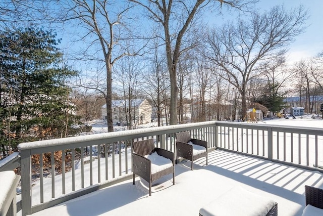 view of snow covered deck