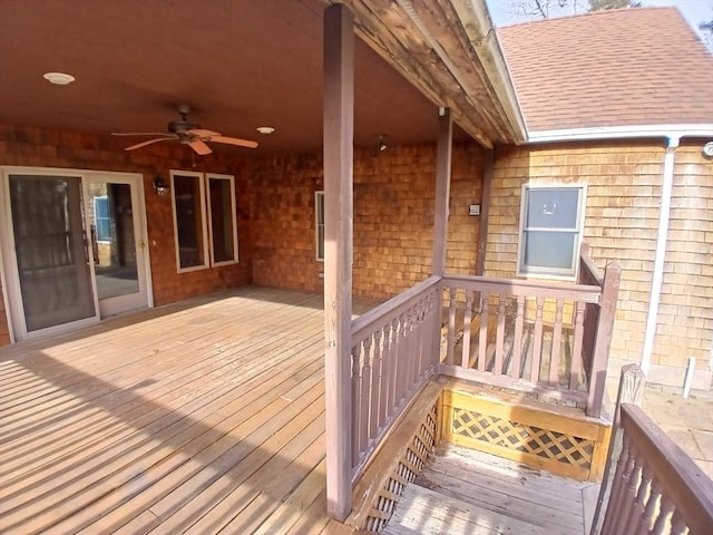 wooden deck with ceiling fan