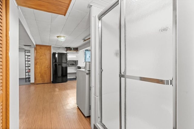 hall featuring light wood finished floors