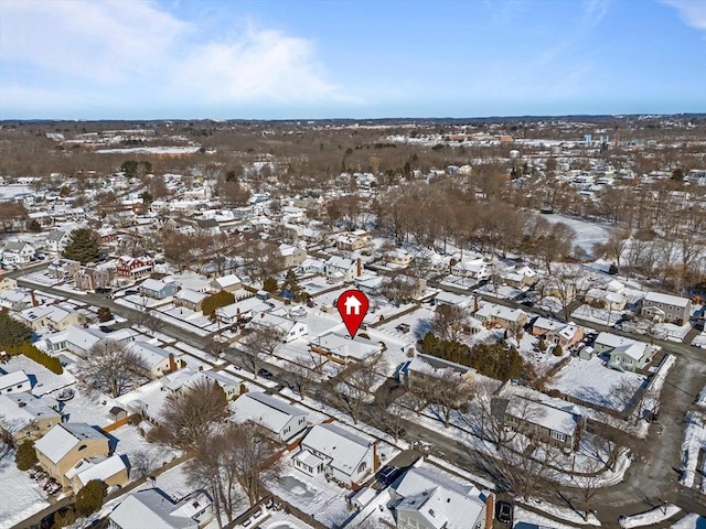 snowy aerial view featuring a residential view