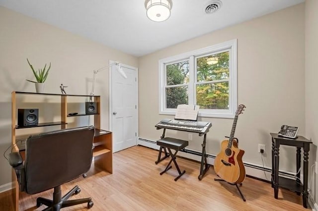 office area with light hardwood / wood-style flooring