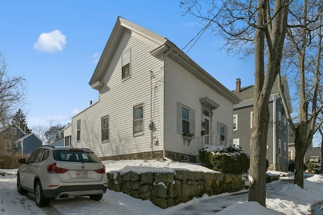 view of snow covered property