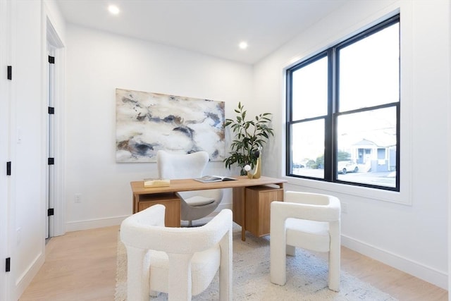 office with recessed lighting, light wood-style flooring, and baseboards