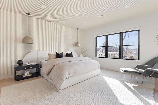 bedroom featuring baseboards