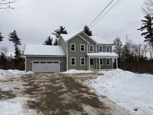 colonial-style house featuring a garage