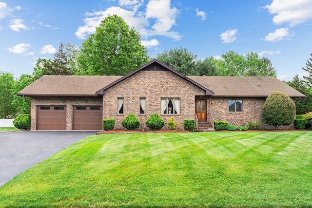 29 Pheasant Ridge Rd, Seekonk, MA 02771 - ranch-style home featuring an attached garage, asphalt driveway, brick siding, and a front lawn
