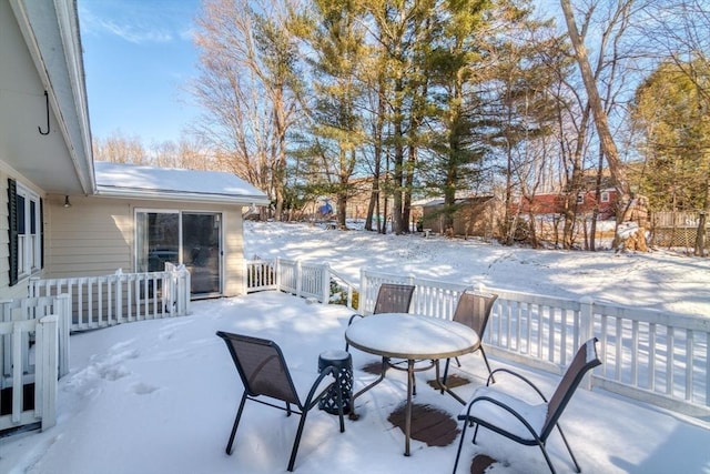 view of snow covered patio