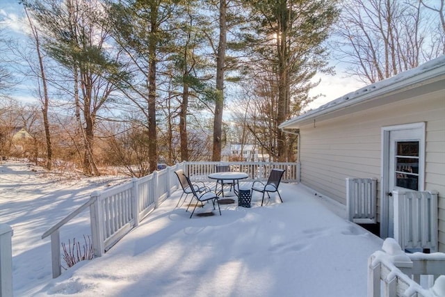 view of snow covered deck