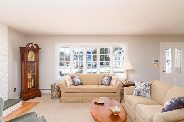 living room featuring a baseboard radiator and carpet floors