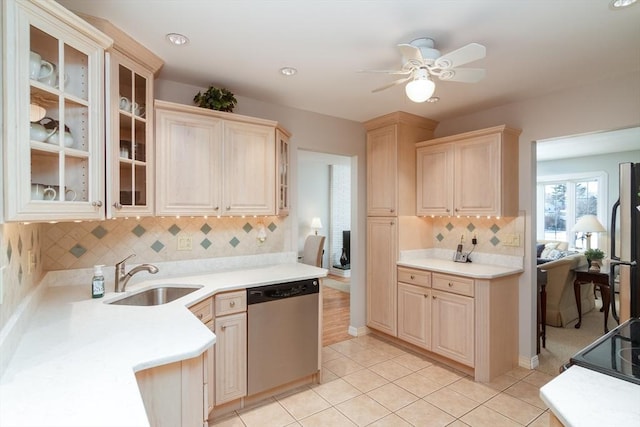 kitchen with sink, refrigerator, dishwasher, and tasteful backsplash