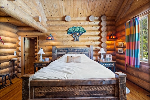 bedroom with wood ceiling, rustic walls, dark hardwood / wood-style flooring, and multiple windows