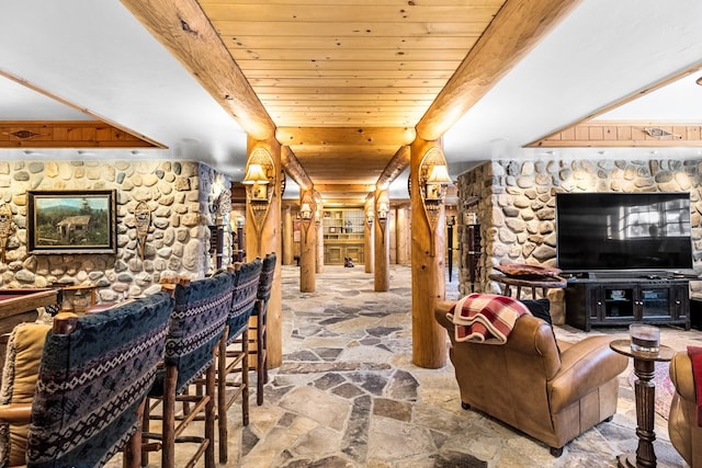 interior space with beamed ceiling and wooden ceiling