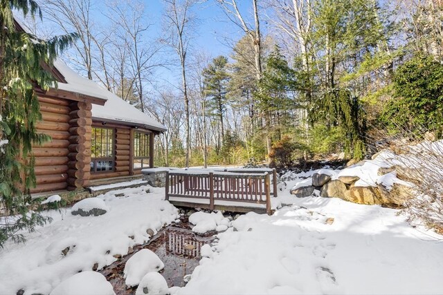 view of snow covered patio