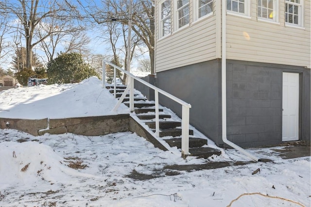 view of snow covered property