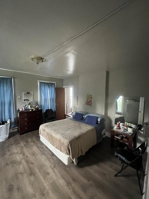 bedroom featuring hardwood / wood-style floors