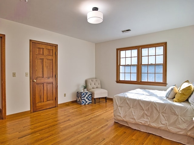 bedroom featuring light hardwood / wood-style flooring