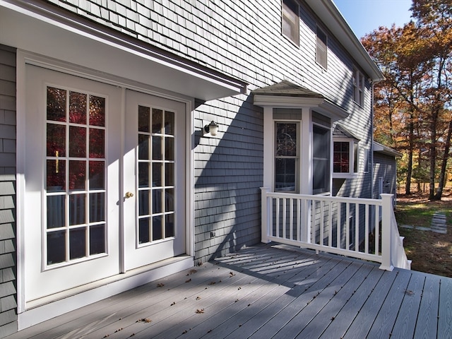 wooden deck featuring french doors