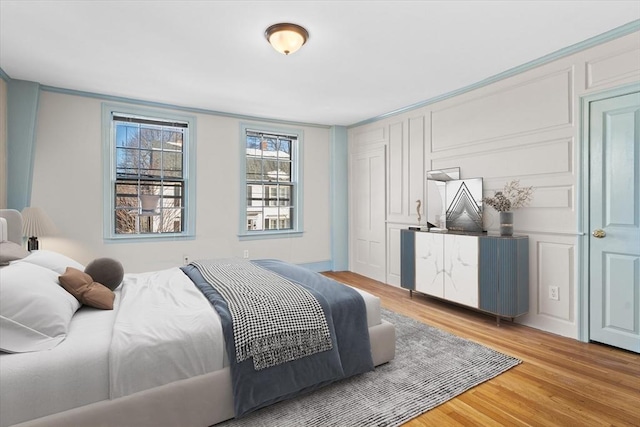 bedroom featuring light wood-type flooring