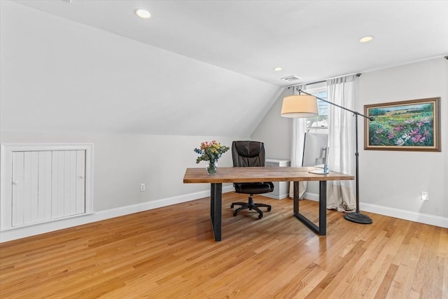 office with vaulted ceiling, recessed lighting, baseboards, and light wood-style floors