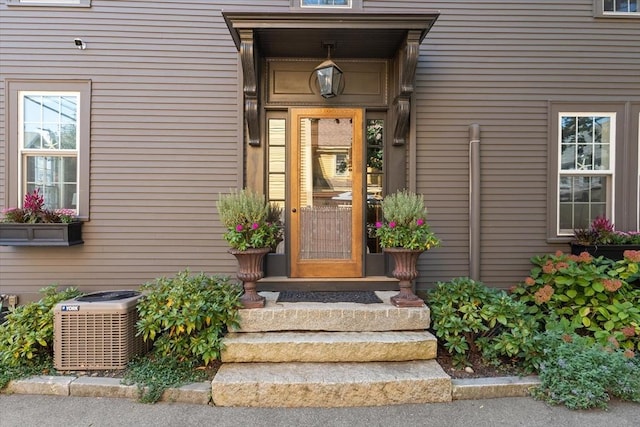 doorway to property with cooling unit