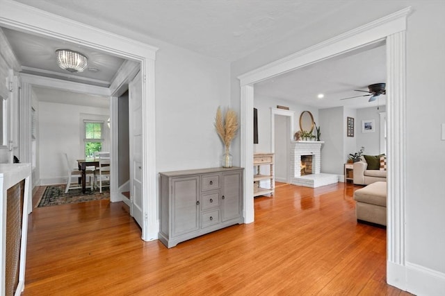 121 W St, Braintree, MA 02184 - hall with light wood finished floors and baseboards