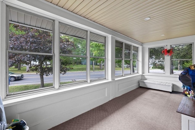 121 W St, Braintree, MA 02184 - sunroom featuring healthy amount of natural light and carpet floors