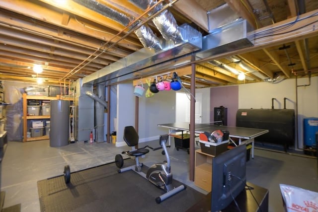 unfinished basement featuring heating fuel and water heater