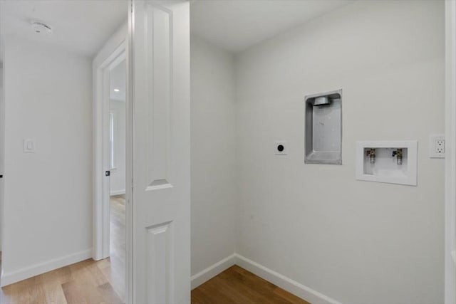106 Broadway, Salem, MA 01970 - laundry room with hookup for a washing machine, wood finished floors, hookup for an electric dryer, and baseboards