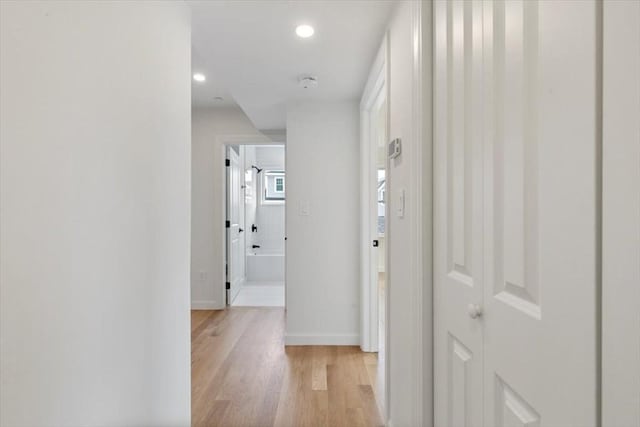 106 Broadway, Salem, MA 01970 - hallway featuring light wood-style flooring, baseboards, and recessed lighting