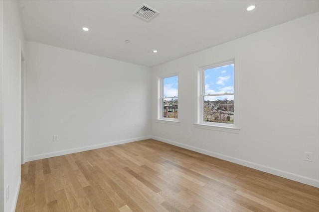 106 Broadway, Salem, MA 01970 - empty room with light wood-style flooring, baseboards, and recessed lighting