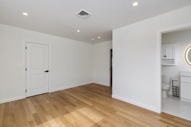 106 Broadway, Salem, MA 01970 - unfurnished room with light wood-style floors, baseboards, and recessed lighting