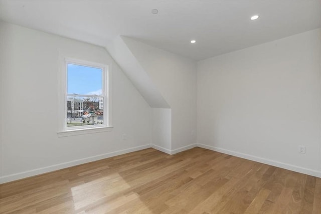 106 Broadway, Salem, MA 01970 - bonus room featuring light wood-type flooring, baseboards, recessed lighting, and vaulted ceiling