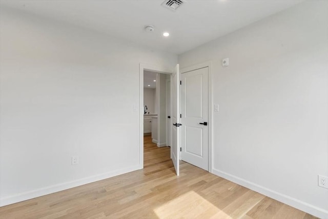 106 Broadway, Salem, MA 01970 - spare room featuring baseboards, light wood-type flooring, and recessed lighting