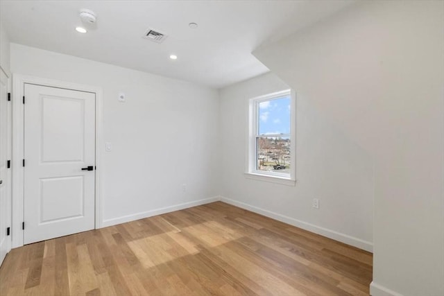 106 Broadway, Salem, MA 01970 - unfurnished room featuring light wood-type flooring, baseboards, a smoke detector, and recessed lighting