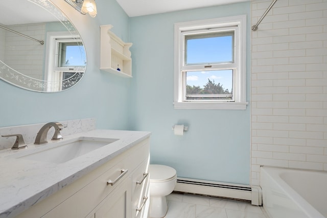 full bathroom with vanity, a baseboard radiator, tiled shower / bath combo, and toilet