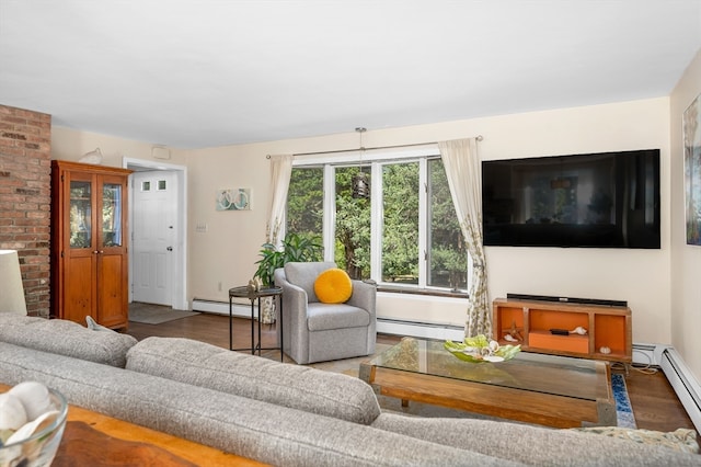 living room featuring baseboard heating and hardwood / wood-style flooring