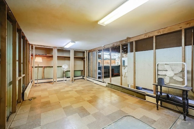 finished basement featuring tile patterned floors