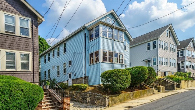 235-237 Corey Rd, Boston, MA 02135 - view of property exterior with stairway