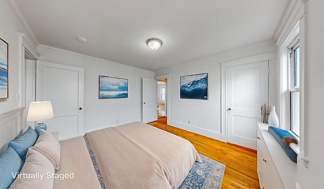 235-237 Corey Rd, Boston, MA 02135 - bedroom featuring light wood finished floors and ornamental molding