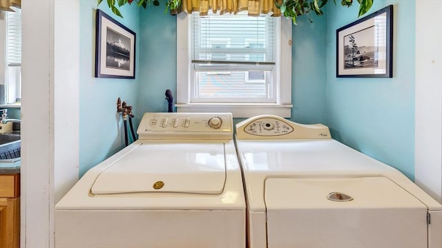 235-237 Corey Rd, Boston, MA 02135 - washroom featuring independent washer and dryer and healthy amount of natural light