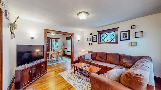 235-237 Corey Rd, Boston, MA 02135 - living room featuring light wood-style floors and baseboards