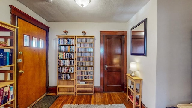 235-237 Corey Rd, Boston, MA 02135 - foyer entrance featuring wood finished floors and baseboards
