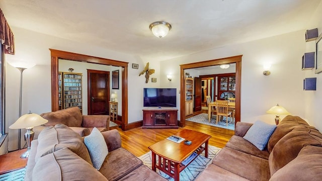 235-237 Corey Rd, Boston, MA 02135 - living room with light wood-style flooring and baseboards