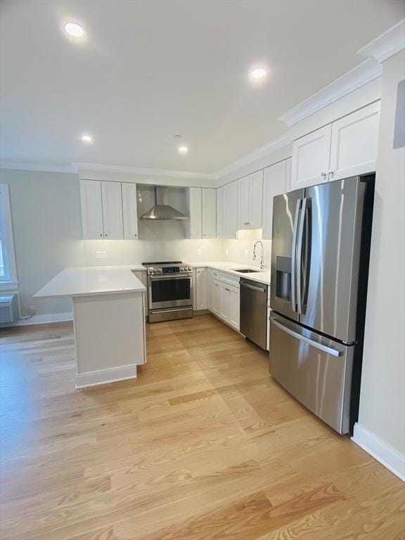 15 Yuill Cir, Boston, MA 02136 - kitchen featuring appliances with stainless steel finishes, wall chimney range hood, crown molding, white cabinets, and light countertops
